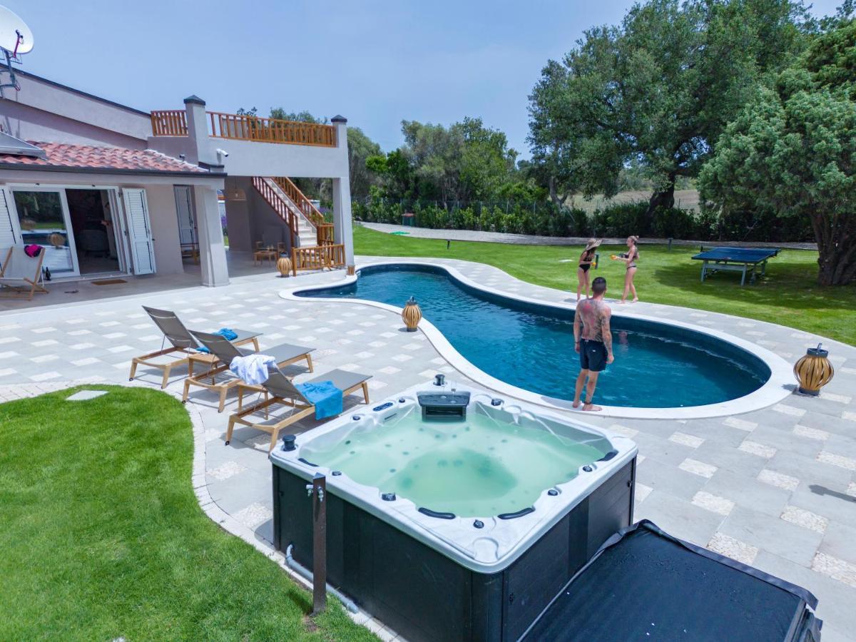 Villa Golden Root Real Estate San Teodoro  Esterno foto